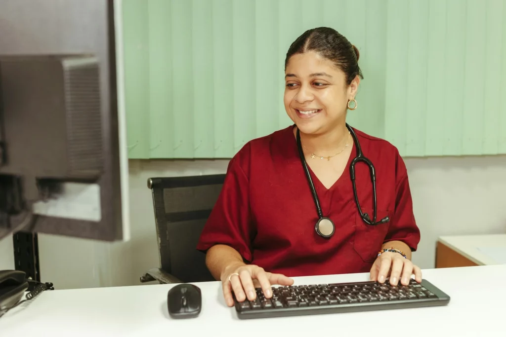 nurse in red scrubs