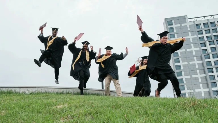 photo - five nursing grads throwing hats and wondering can a new grad nurse be a travel nurse
