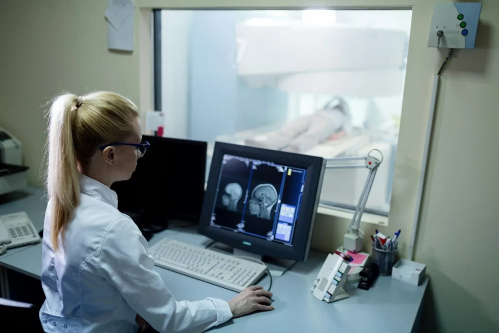 woman looking at MRI results 