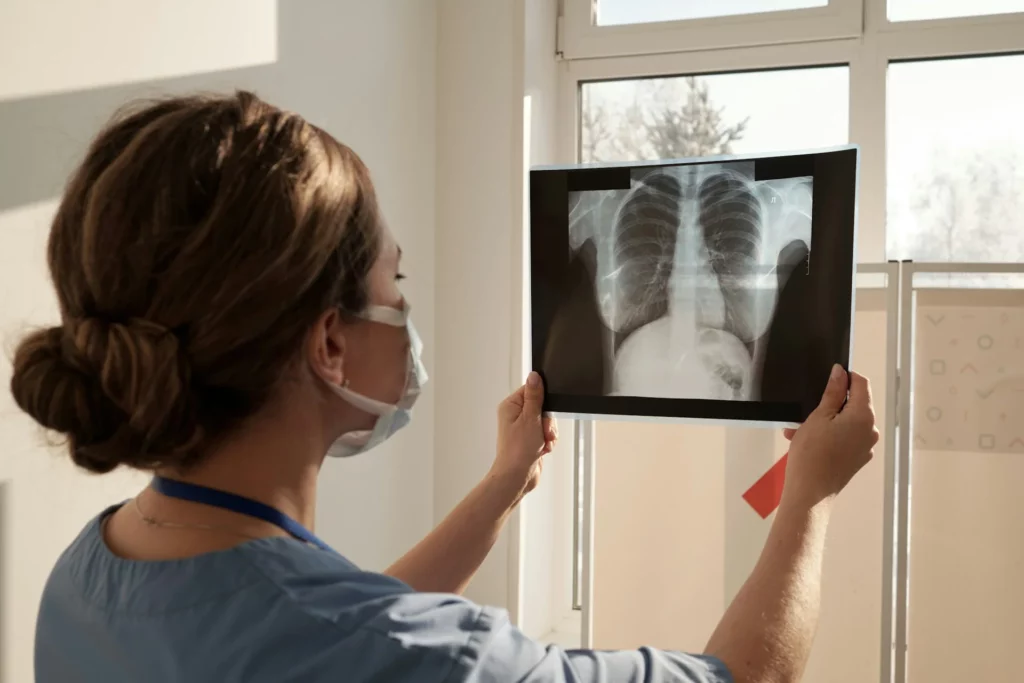 nurse looking at radiology results 