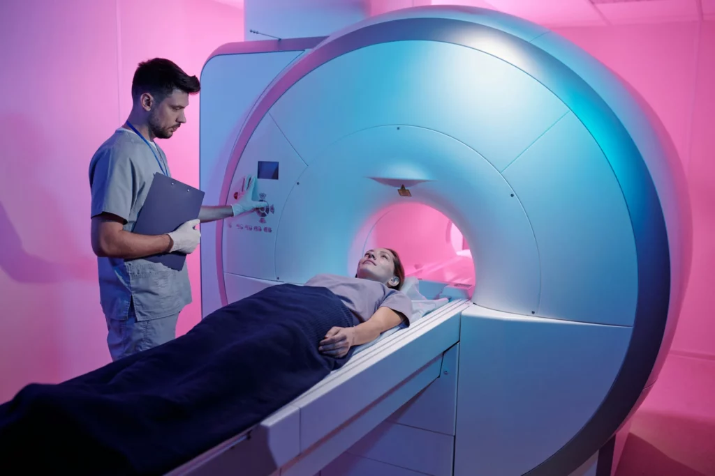 man going into a MRI machine 