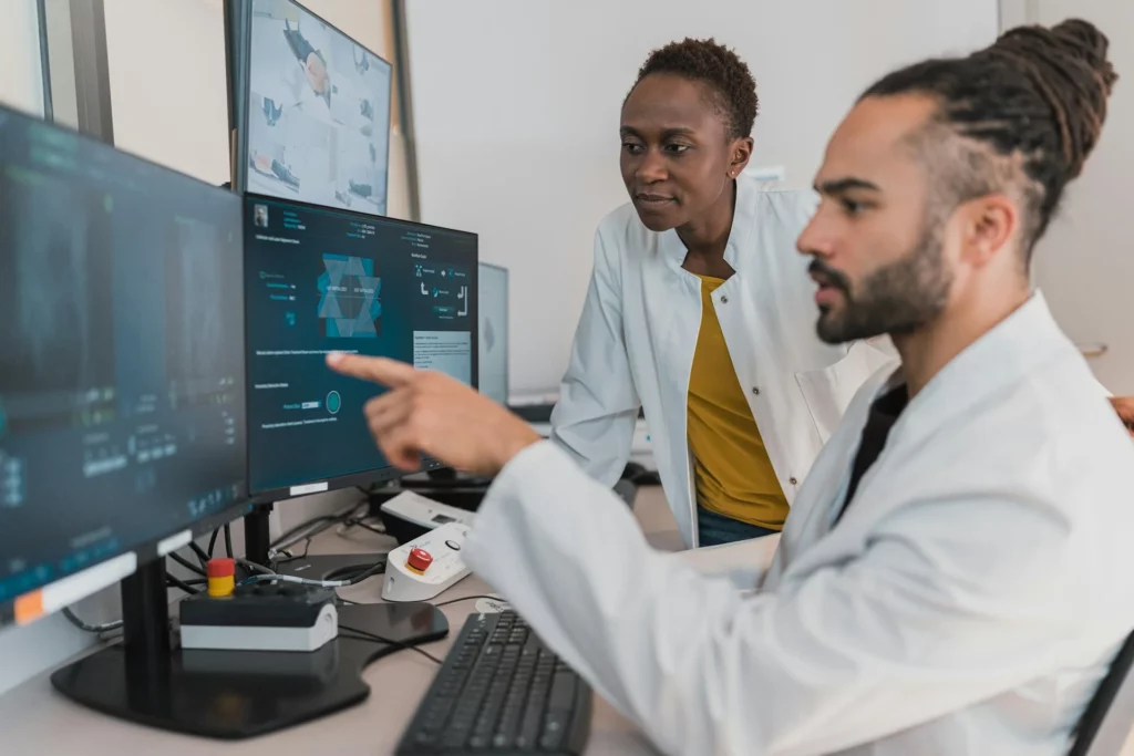 nurses looking at MRI results 