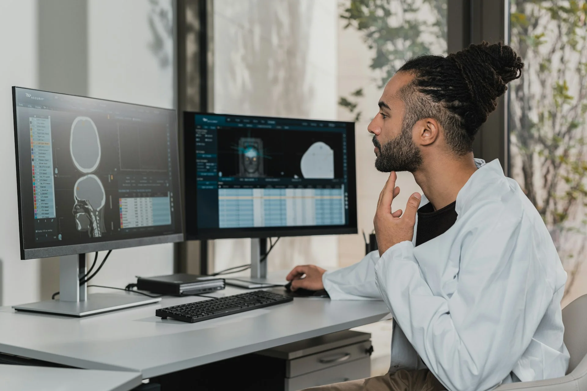 man looking at a computer